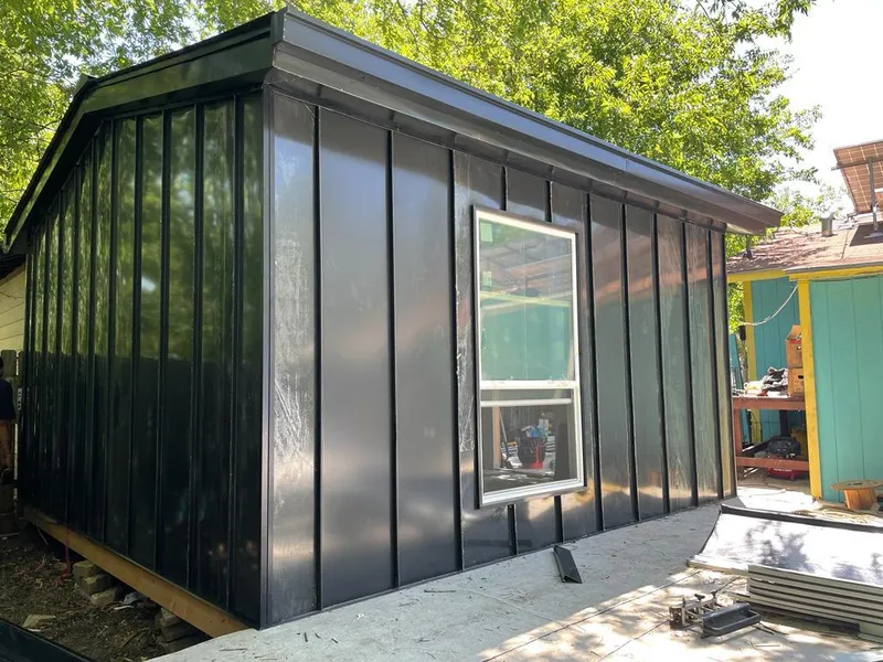 Black standing seam metal wall panels for Metal Roof Installation in Beaver Dam