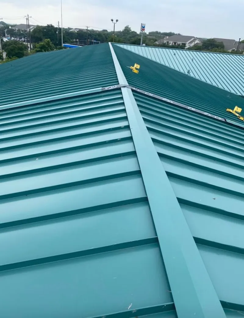 Green commercial metal roof ridge and valley for Metal Roof Repair in Beaver Dam