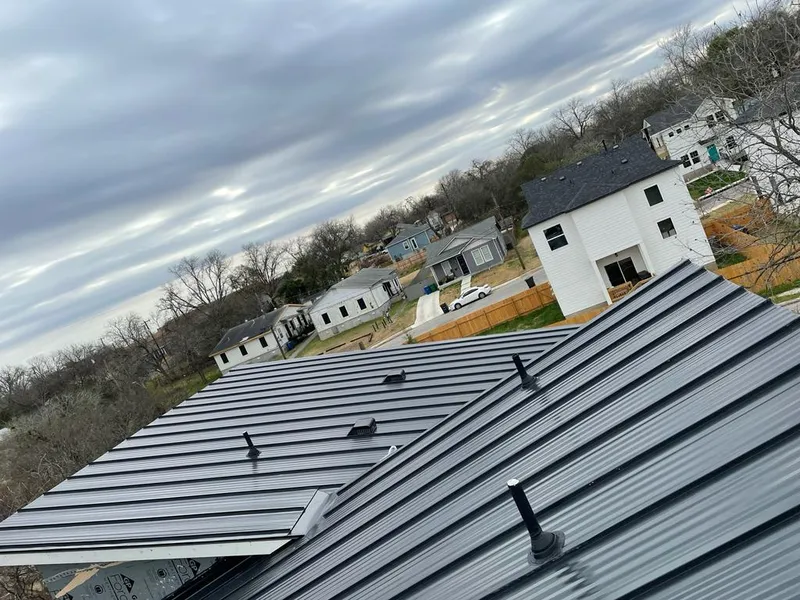 Standing seam metal roof panels with vents for Skylight Repair in Beaver Dam